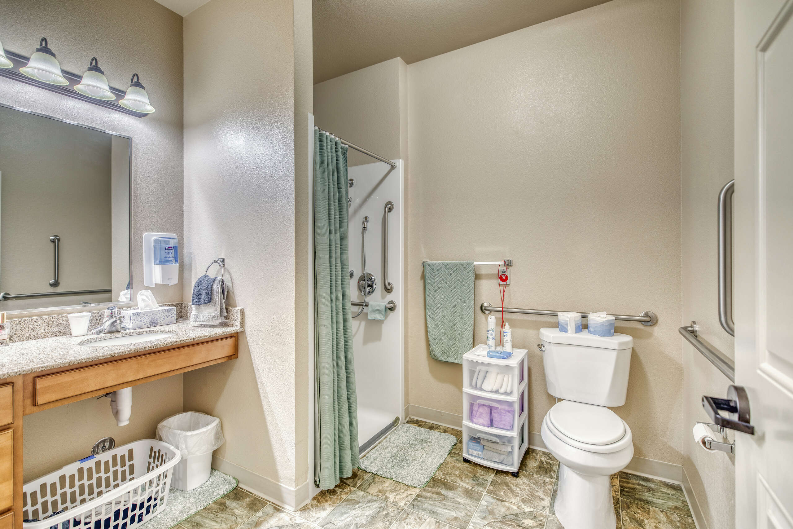 Well-equipped bathroom in a resident's room