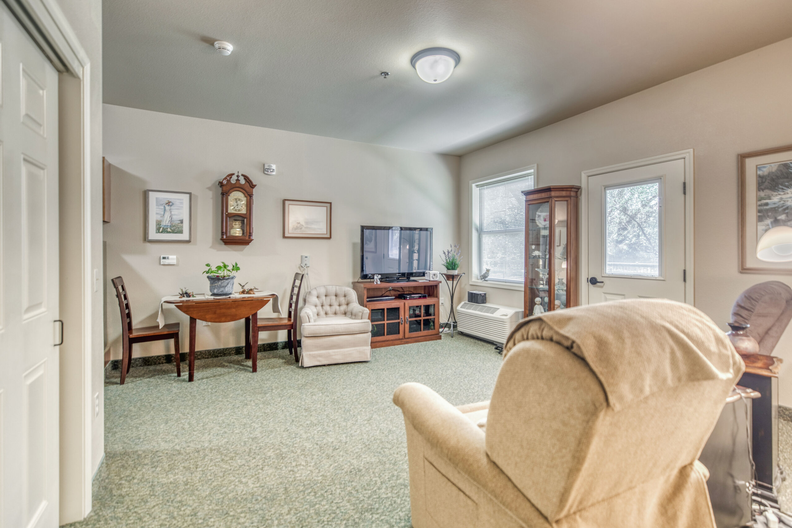 Interior of a cozy resident room with furniture