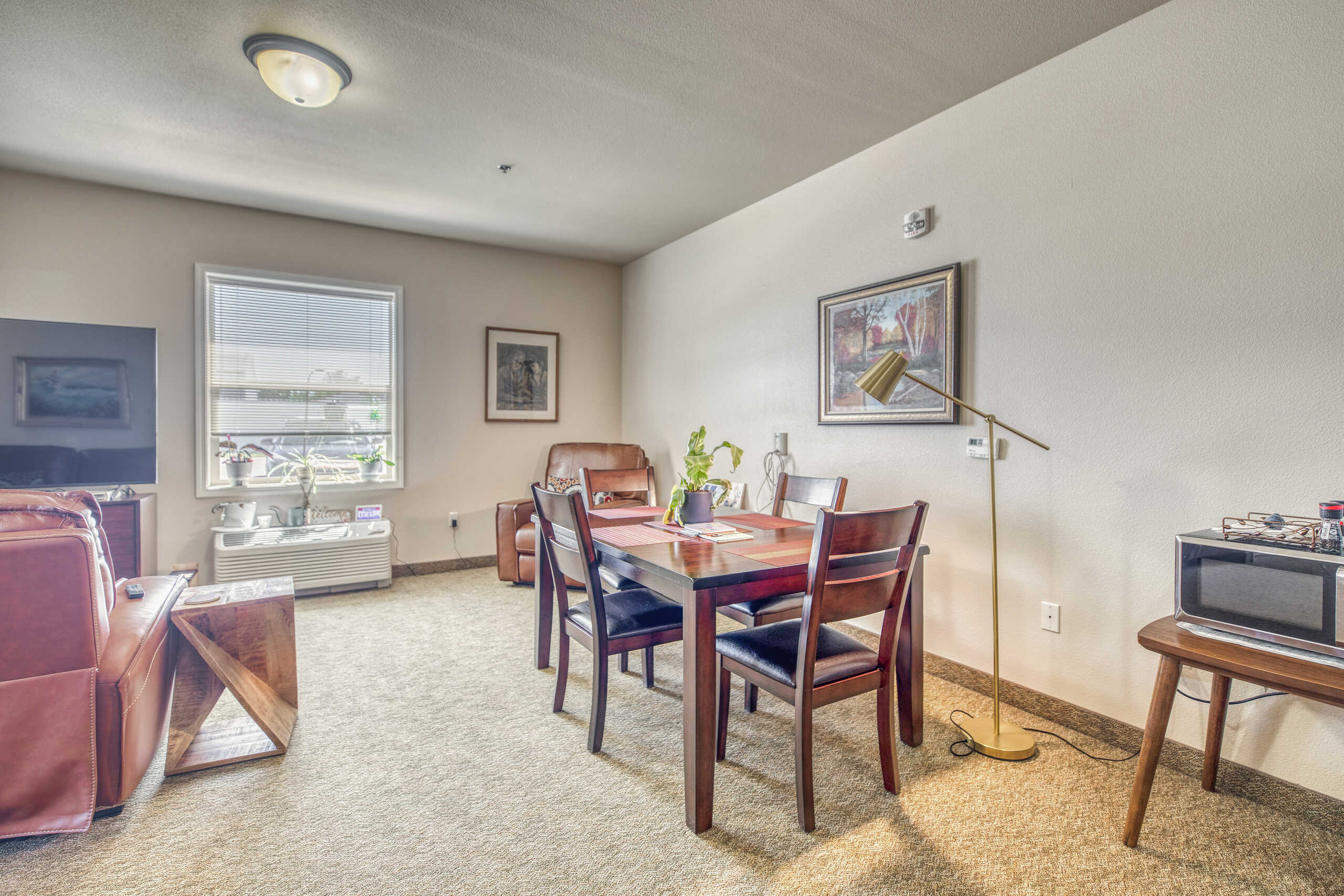 Interior living space with dining table and chairs