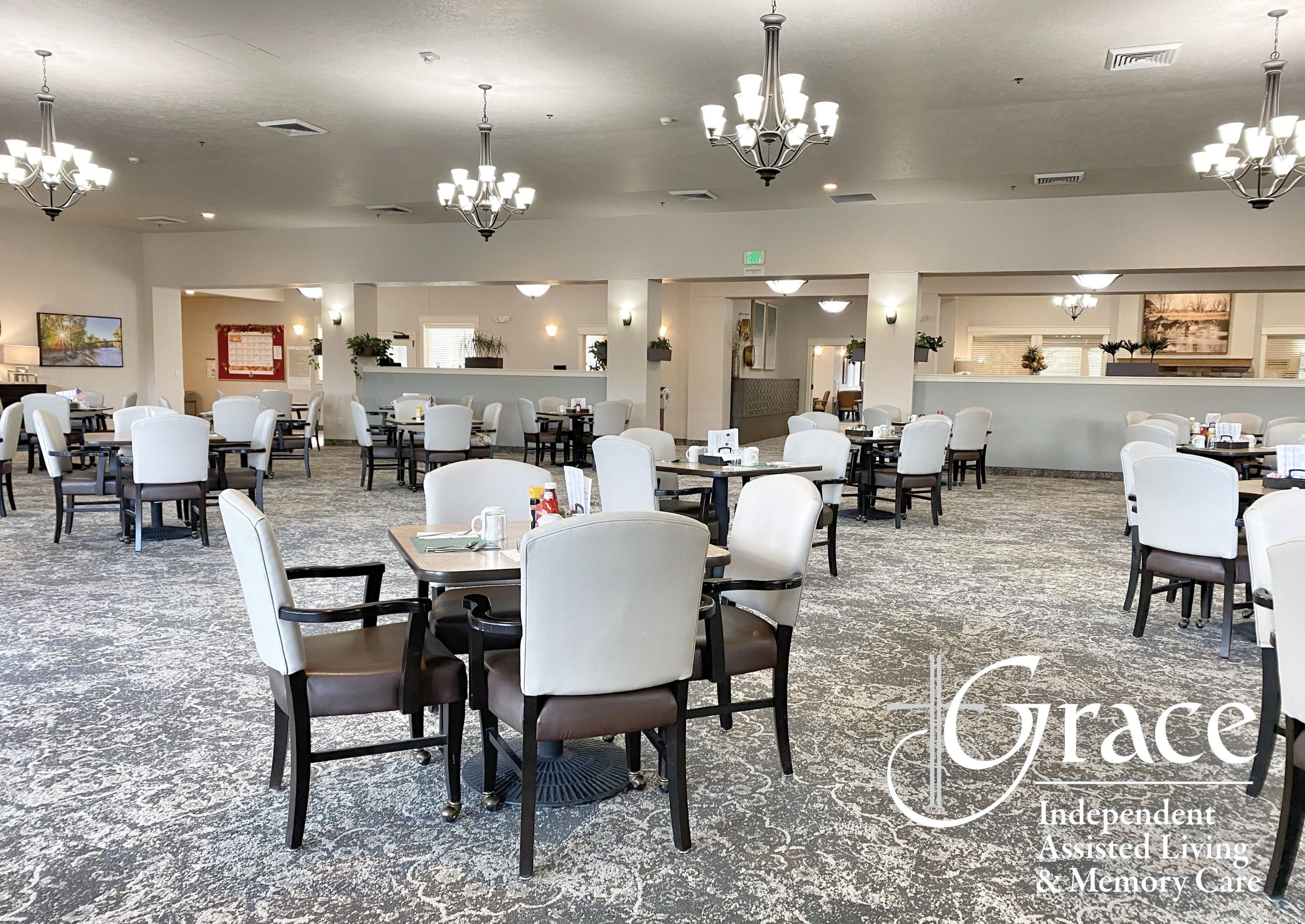 Bright dining room with tables set for meals