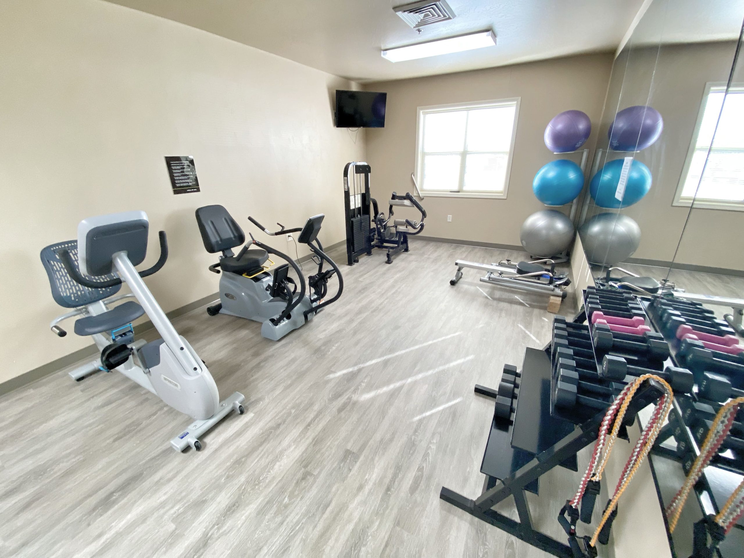 Interior view of a fitness room with exercise equipment