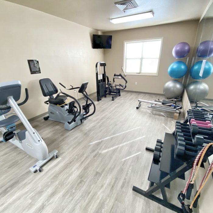 Interior view of a fitness area with exercise equipment