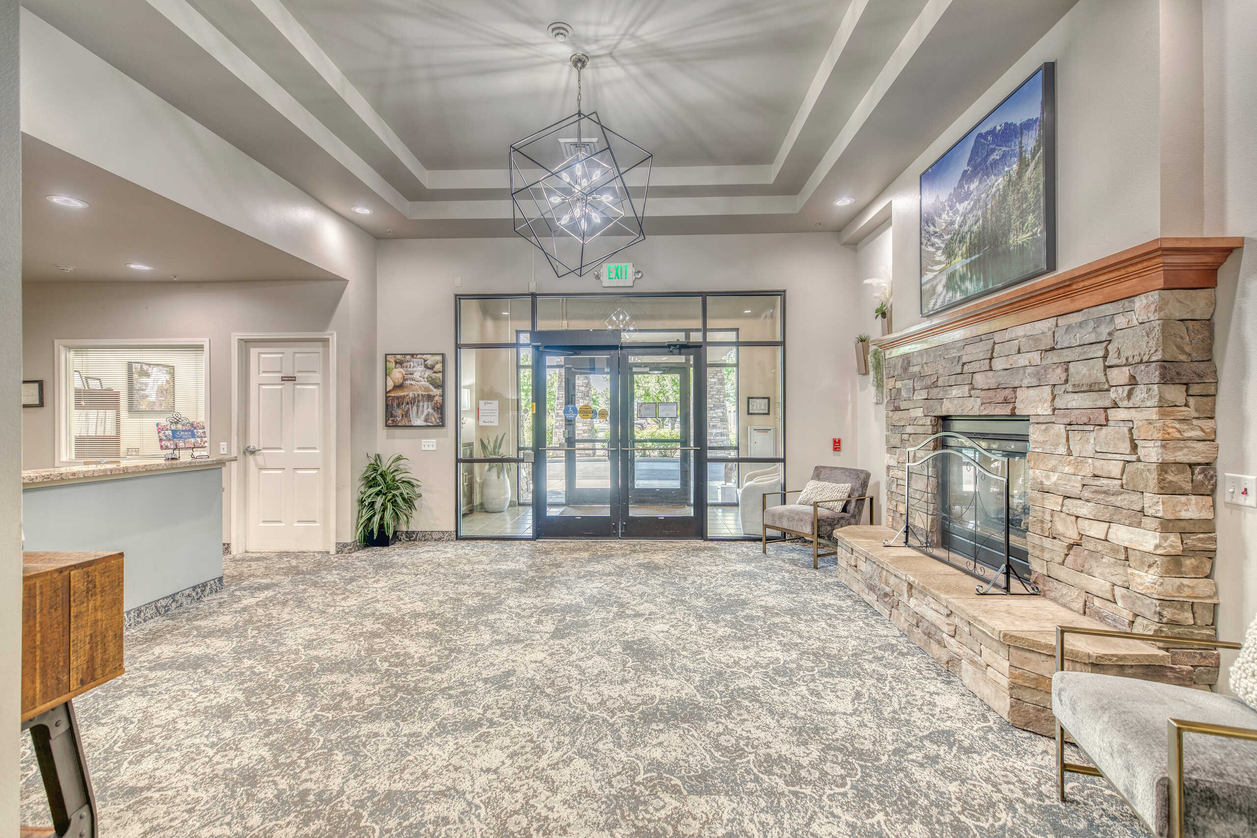 Interior lobby with seating and fireplace