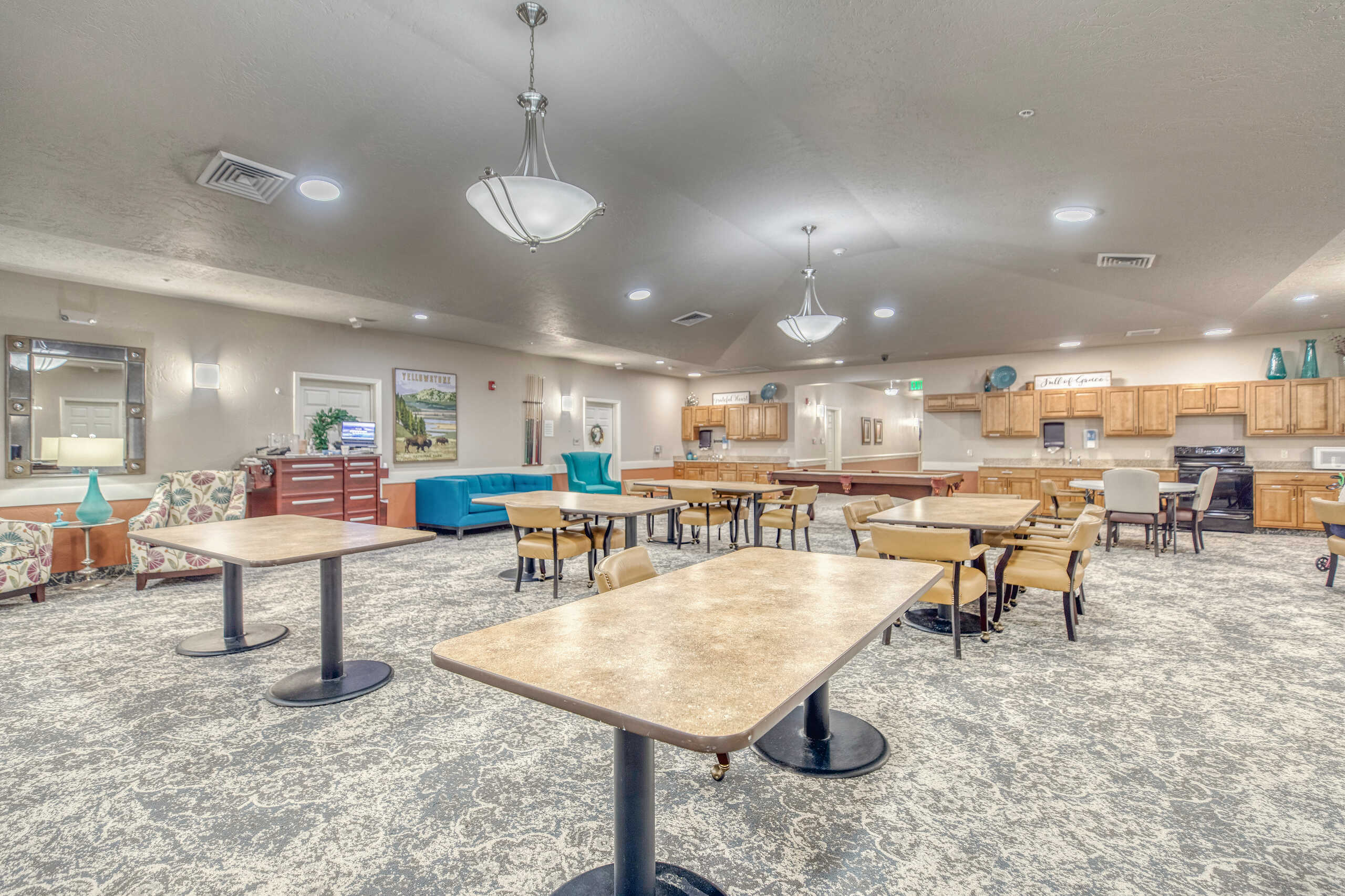 Interior view of a common area with tables and chairs