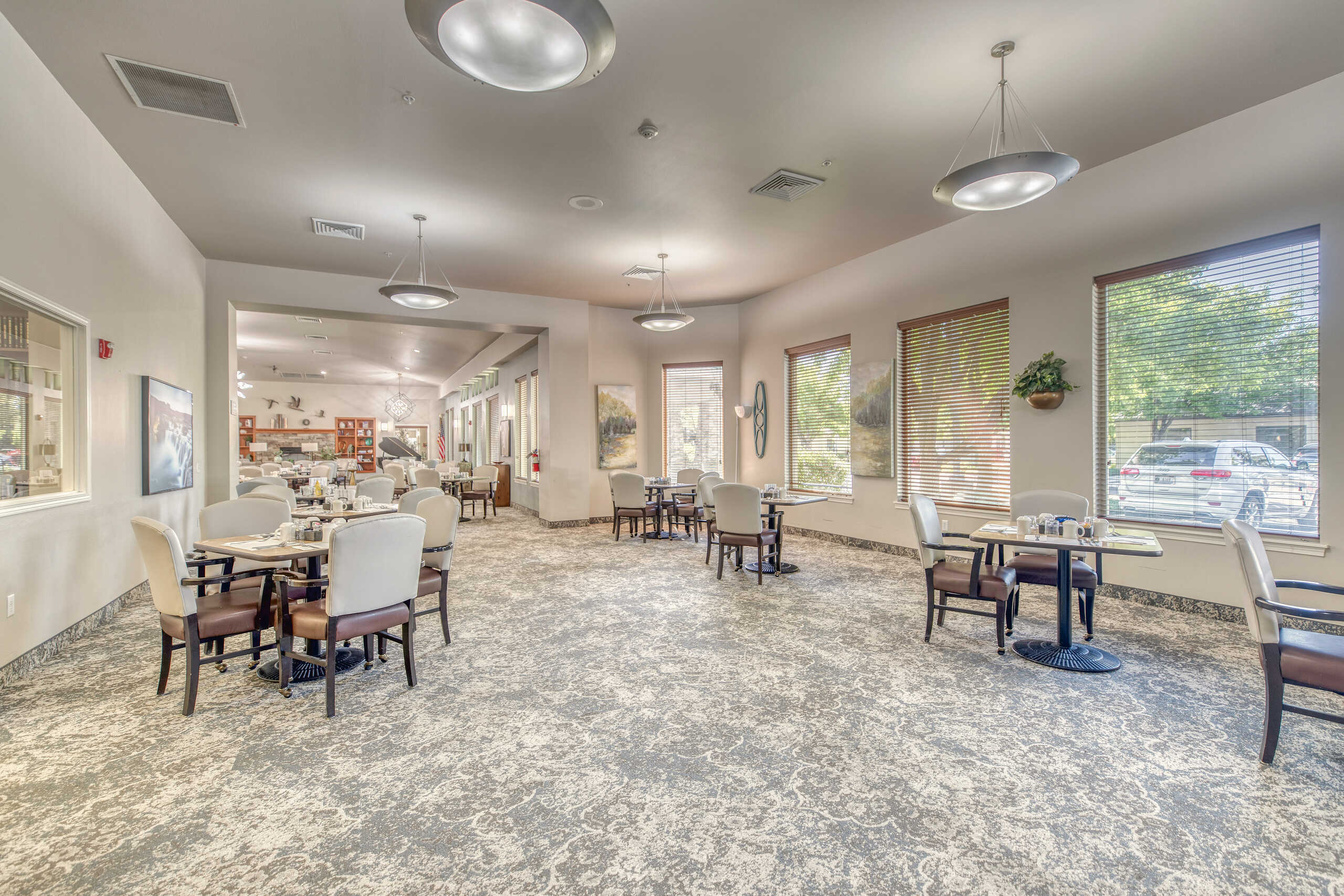 Interior dining room with tables and chairs