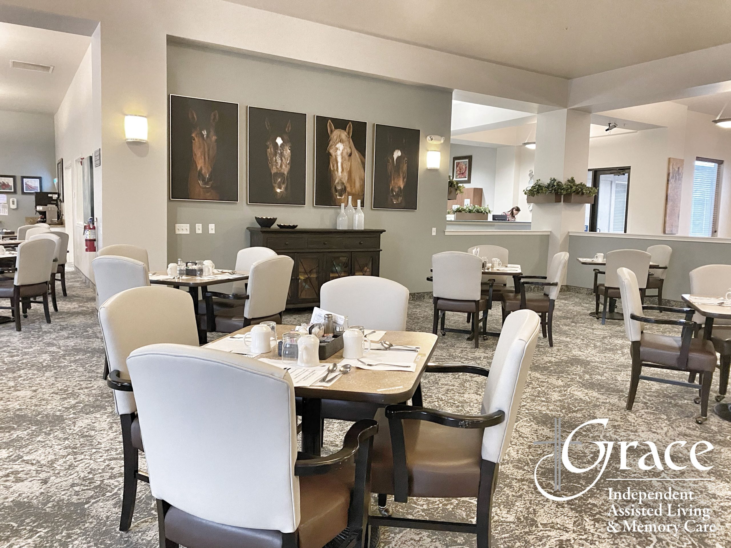 Dining area with tables set for a meal