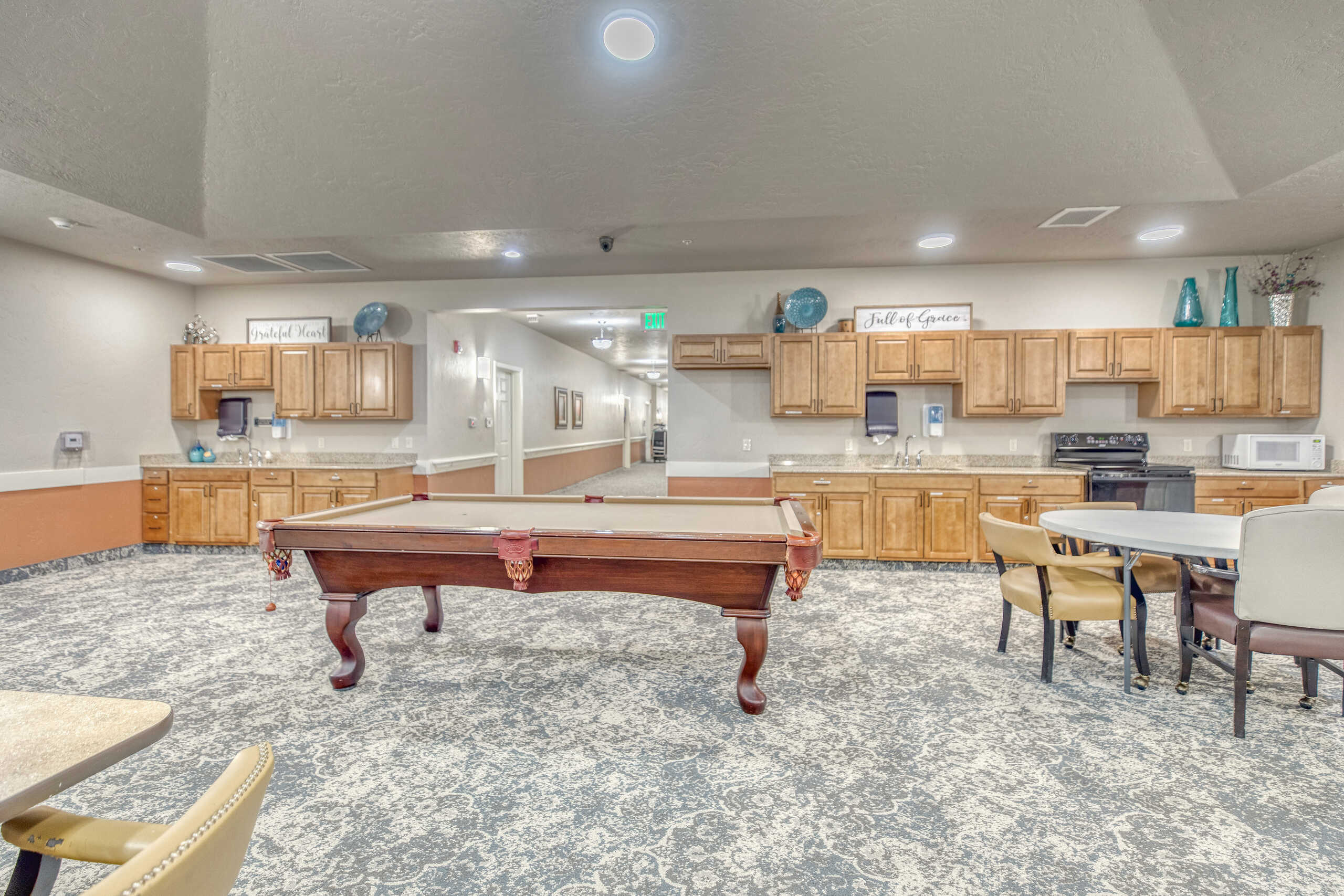 Interior view of a social area with a pool table