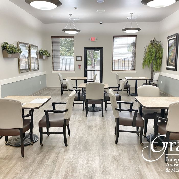 Bright common area with seating and tables