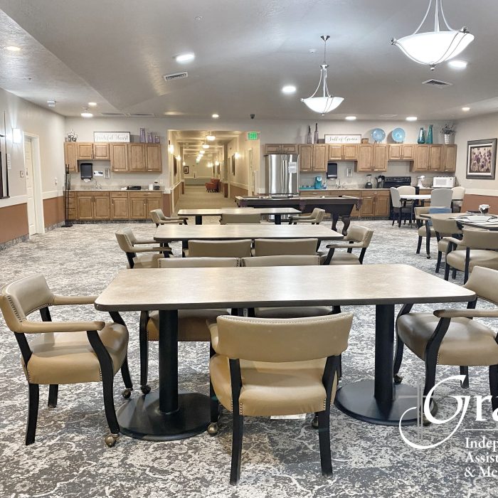 Bright common area with tables and chairs