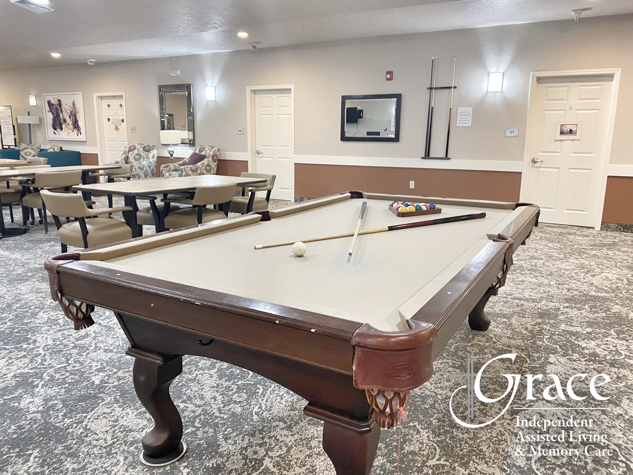 Interior view of a game room with a pool table