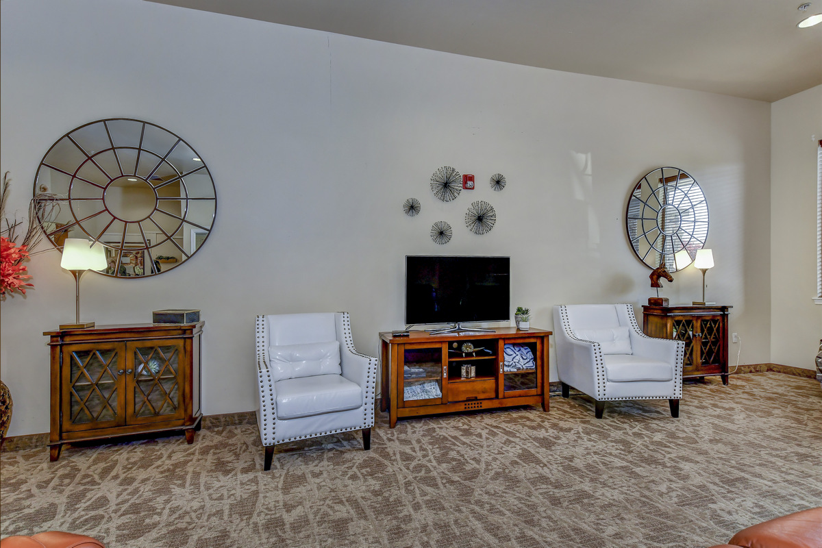 Bright common area with comfortable seating and decor