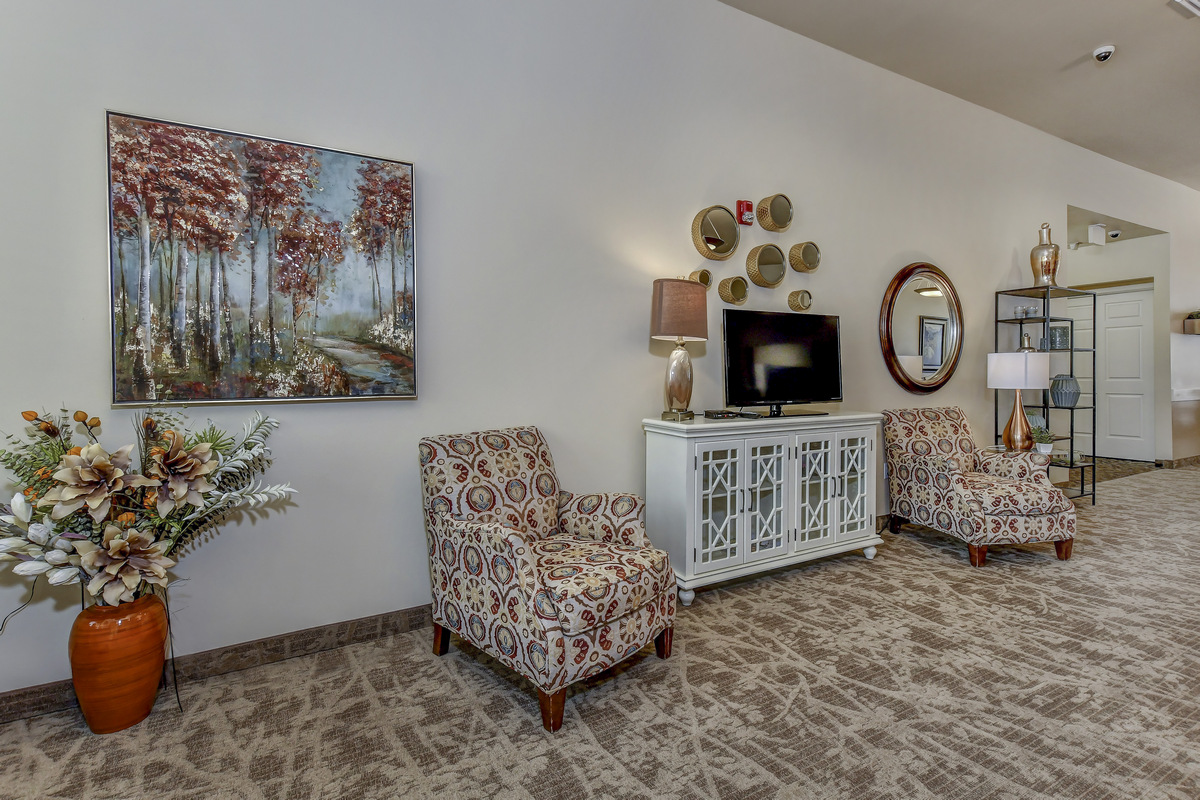 Bright common area with comfortable seating and decor