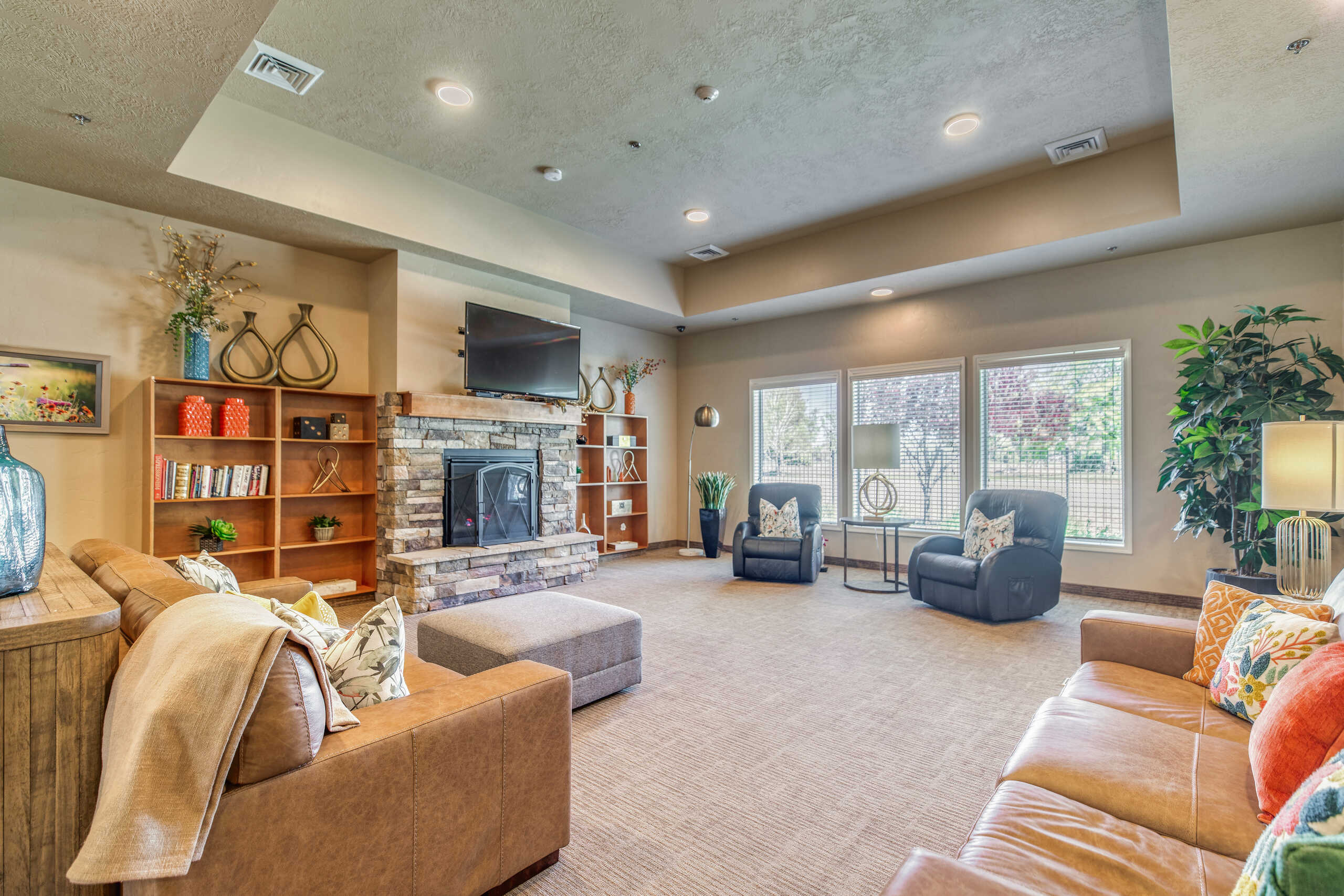 Cozy common area with seating and fireplace