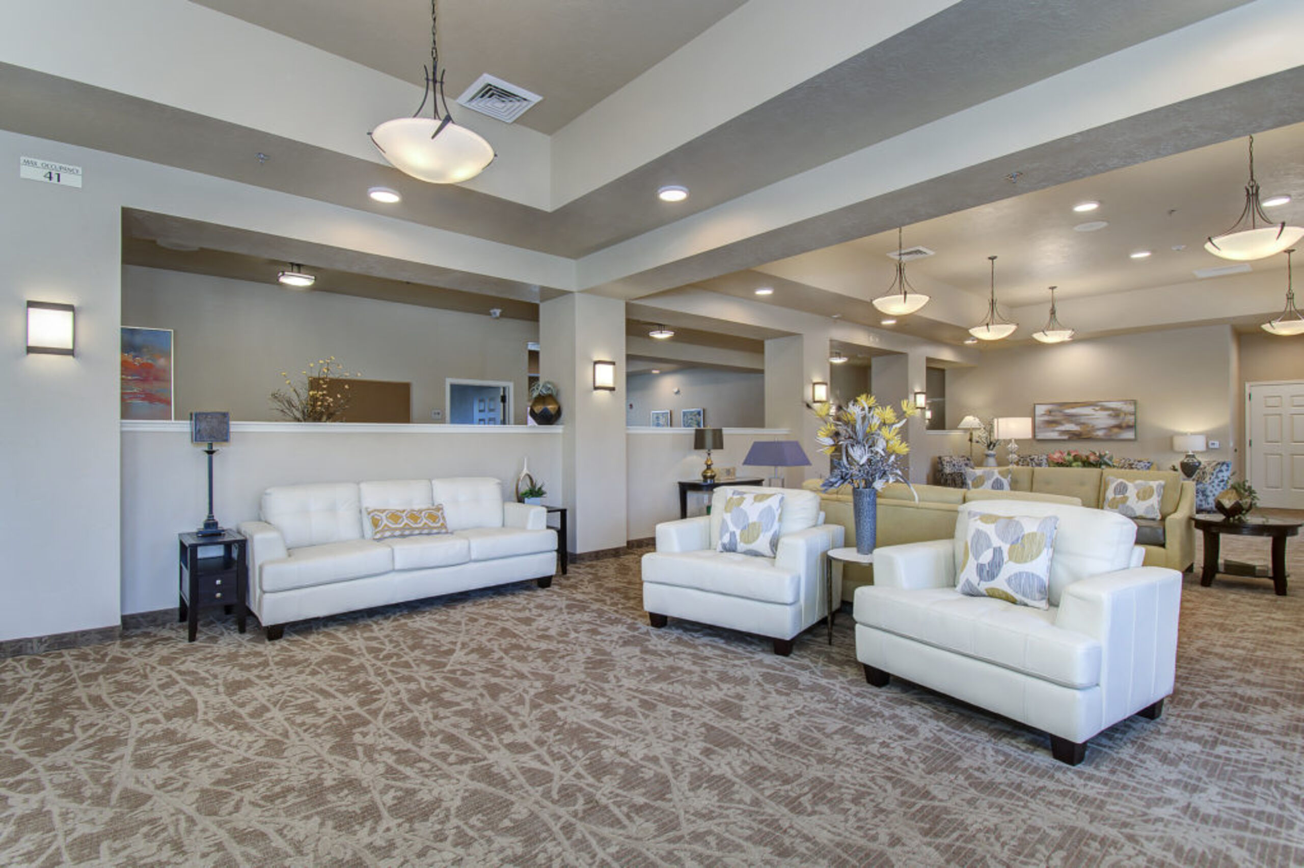 Bright, welcoming common area with comfortable seating