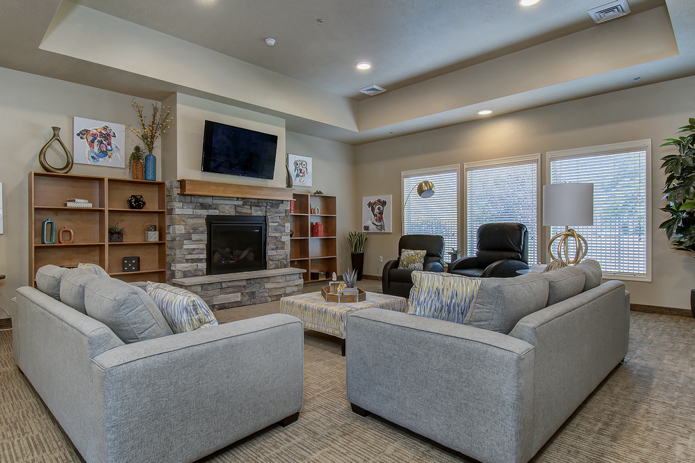 Common area with comfortable seating and a fireplace