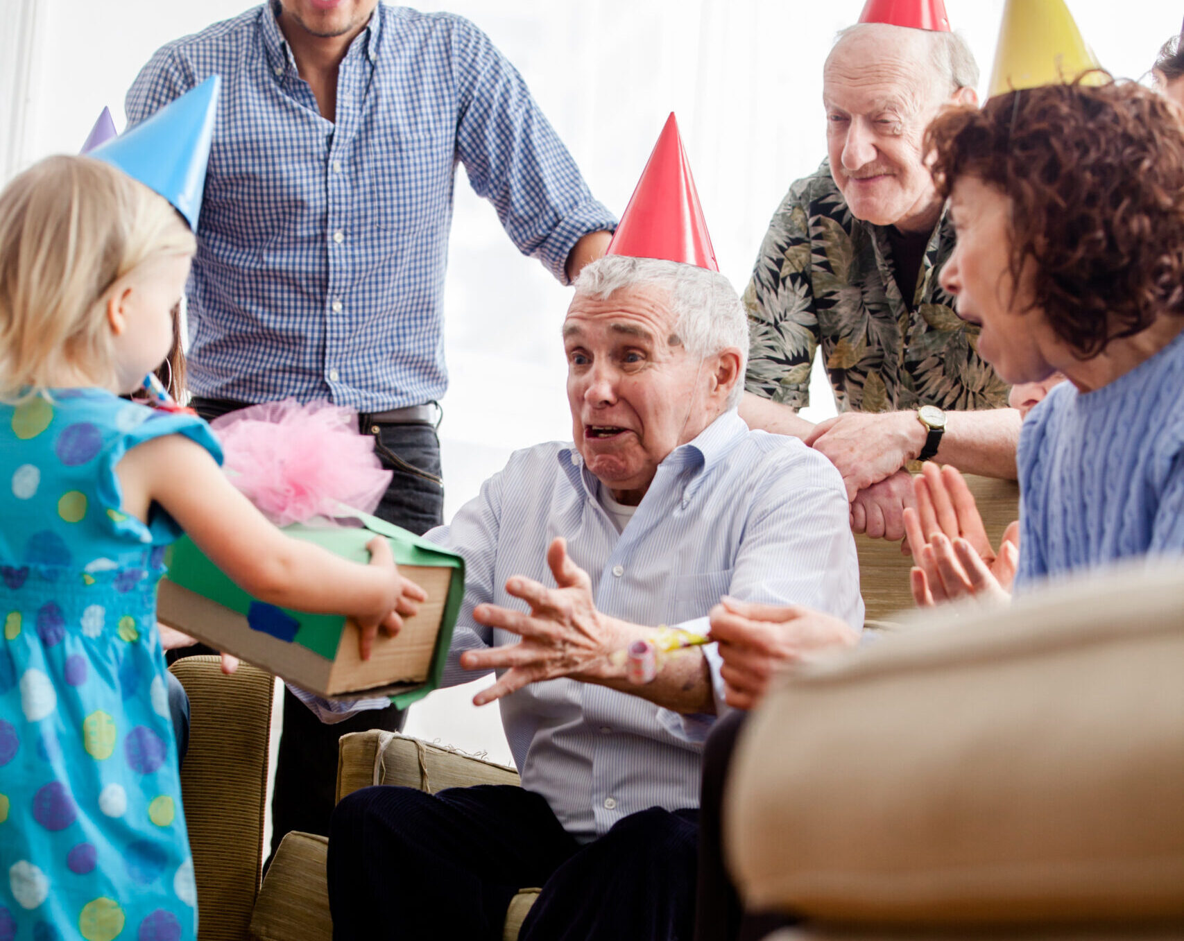 Residents celebrating a birthday with a child