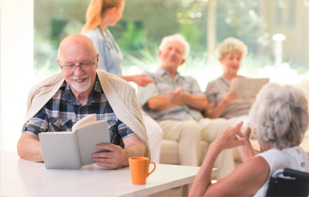 Residents enjoying time together in a common area