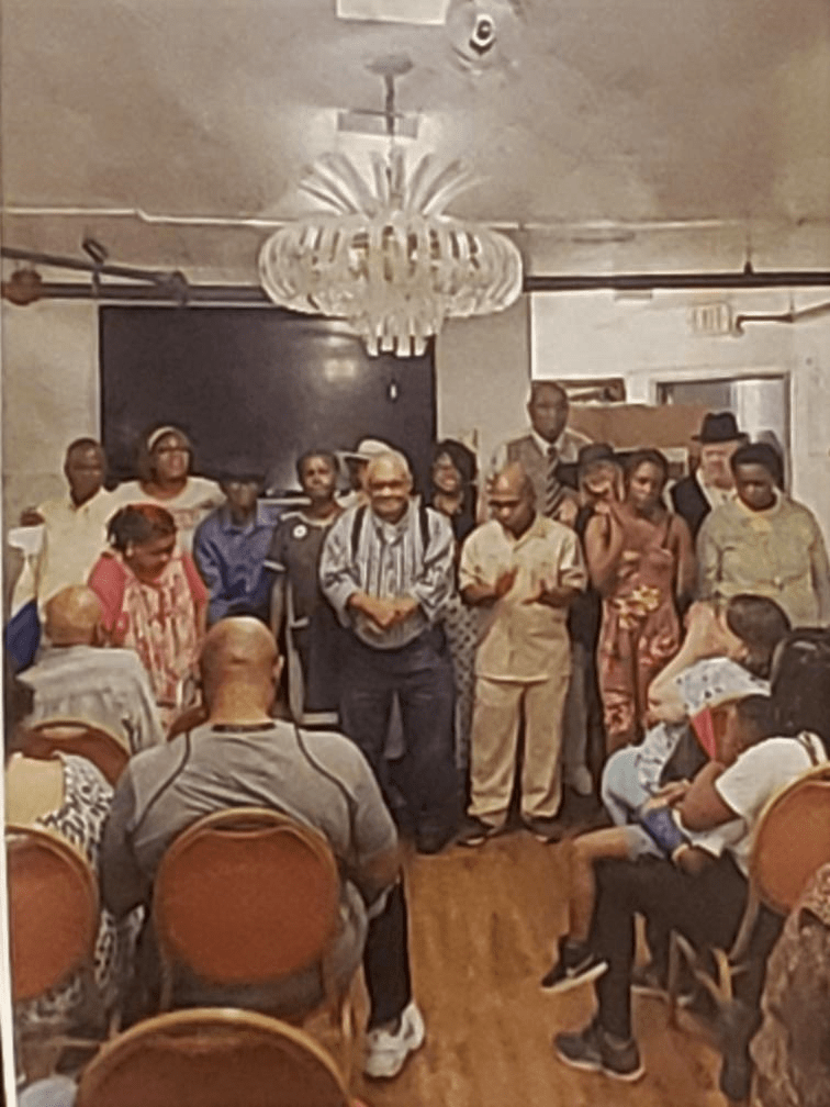 Residents and staff engaged in a lively event.