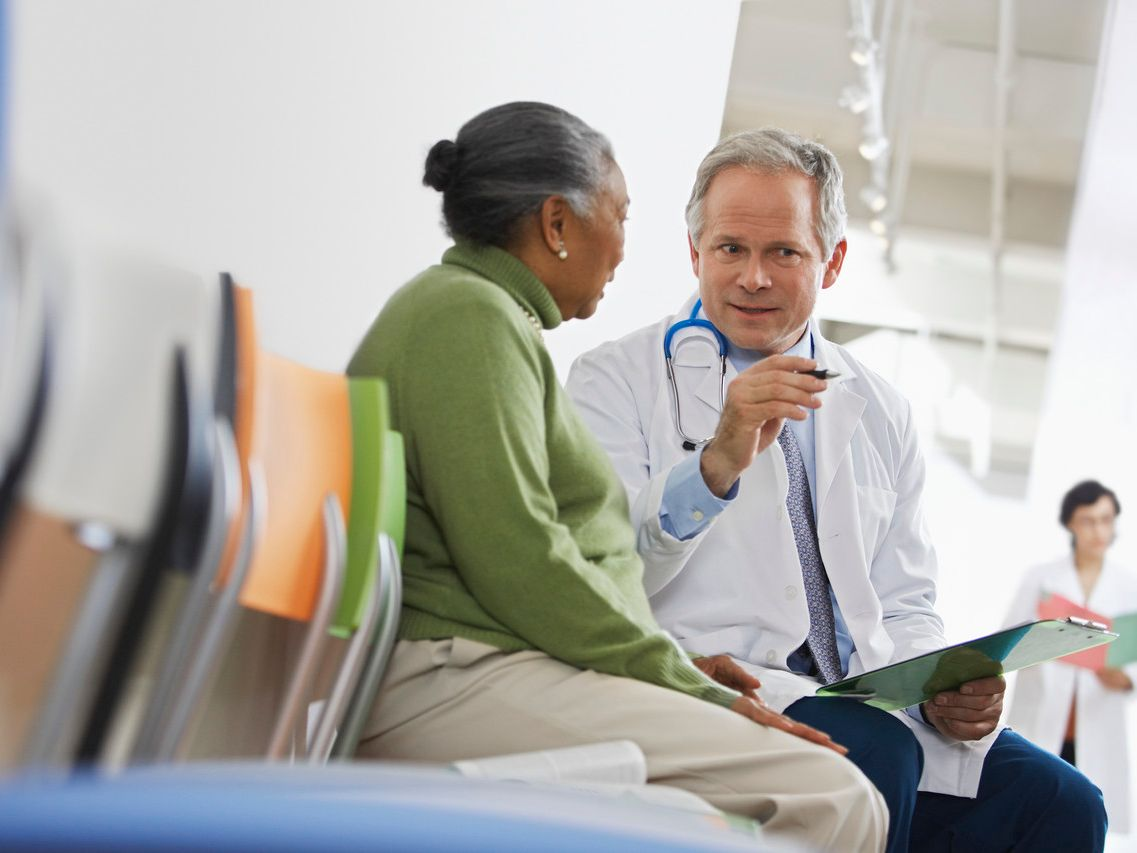 Doctor consulting with a female resident
