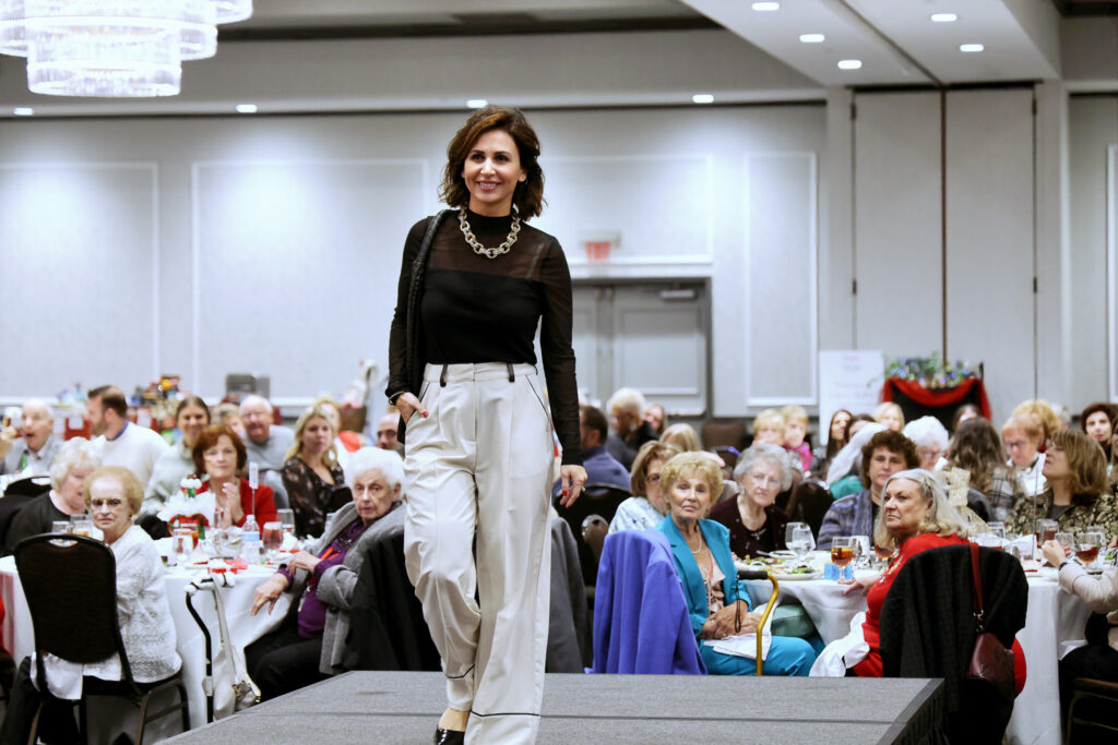 Residents enjoying a fashion show event
