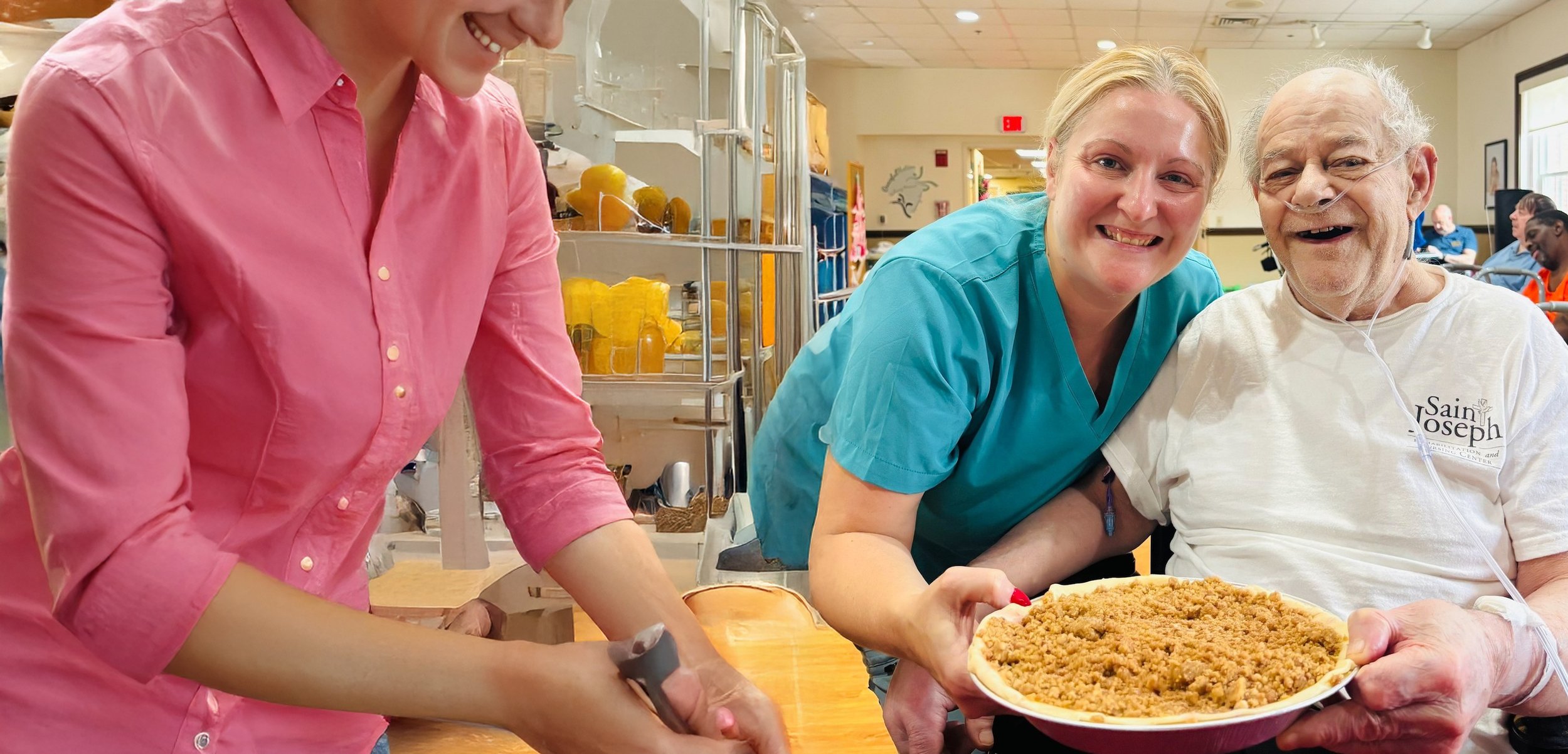 Staff and resident sharing a meal together