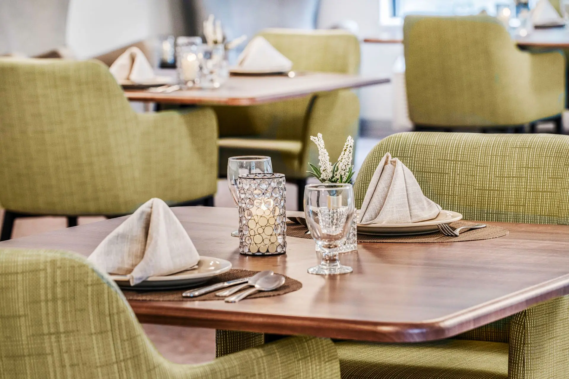 Dining table set with elegant decor.
