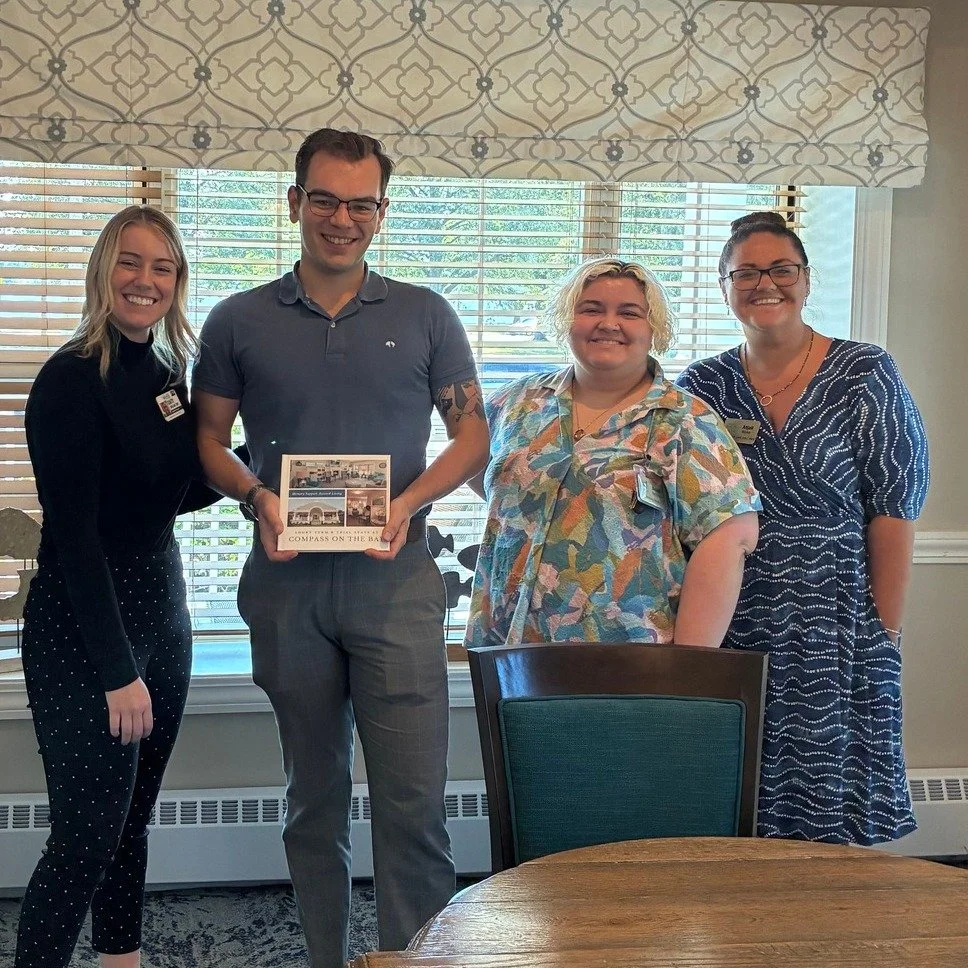 Staff celebrating milestone with residents