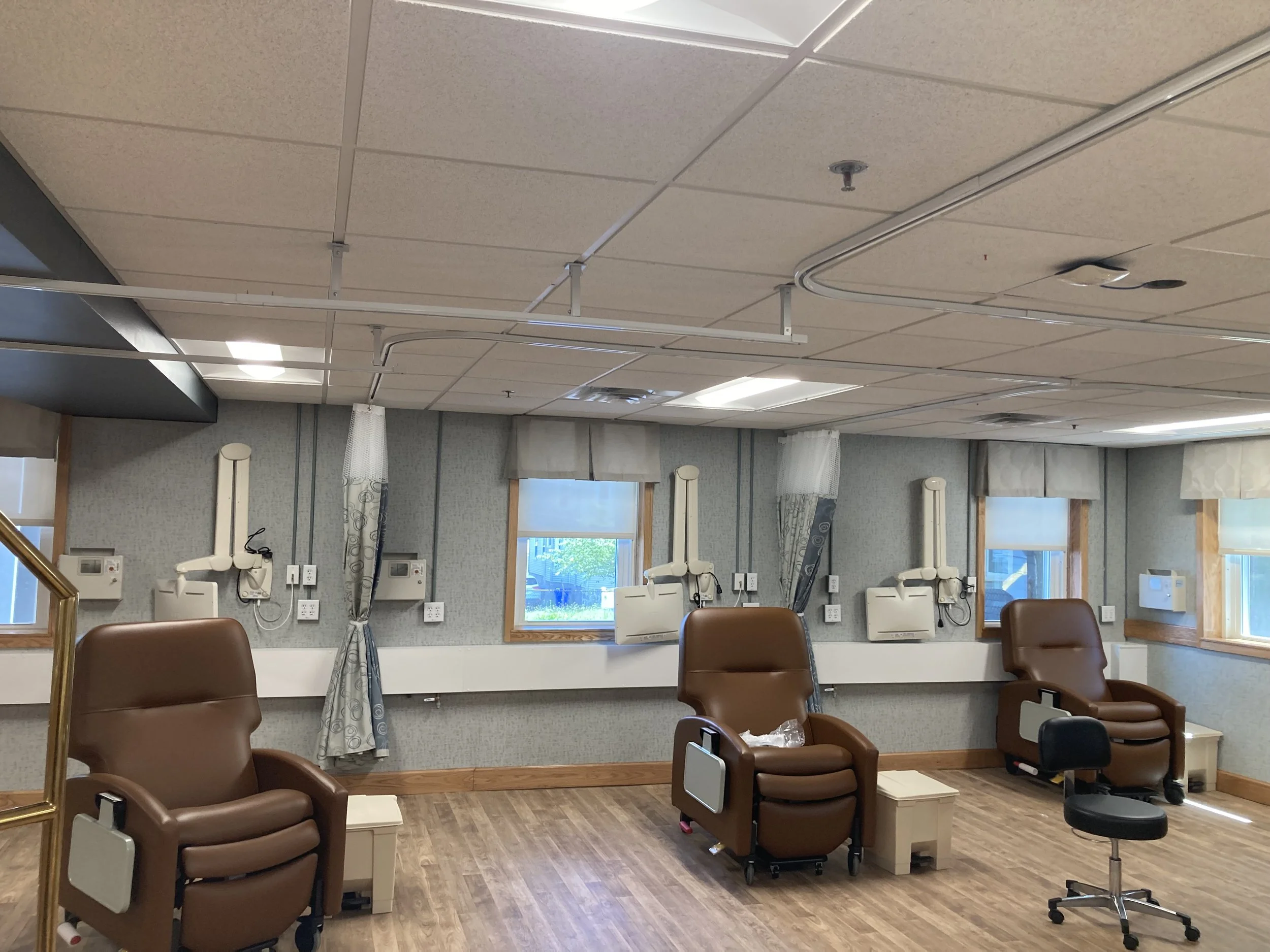 Interior room with reclining chairs and medical equipment.