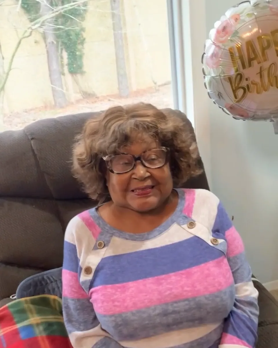 Senior resident celebrating birthday indoors