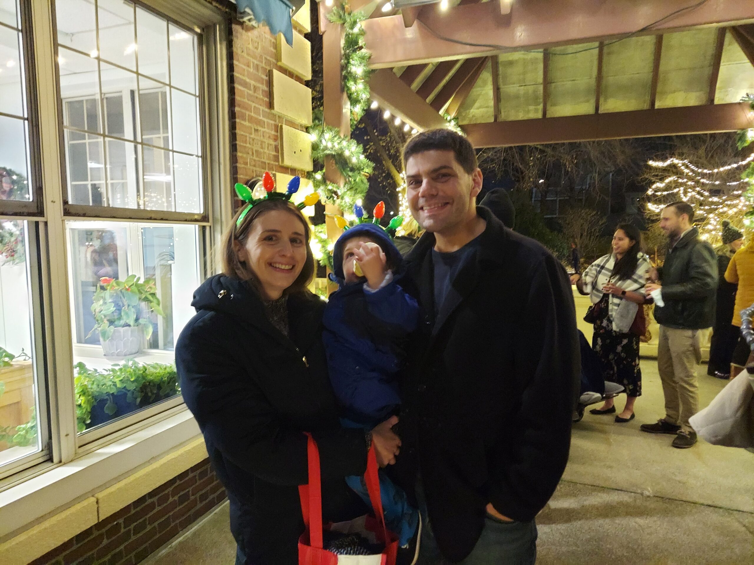 Family gathering with festive decorations outside