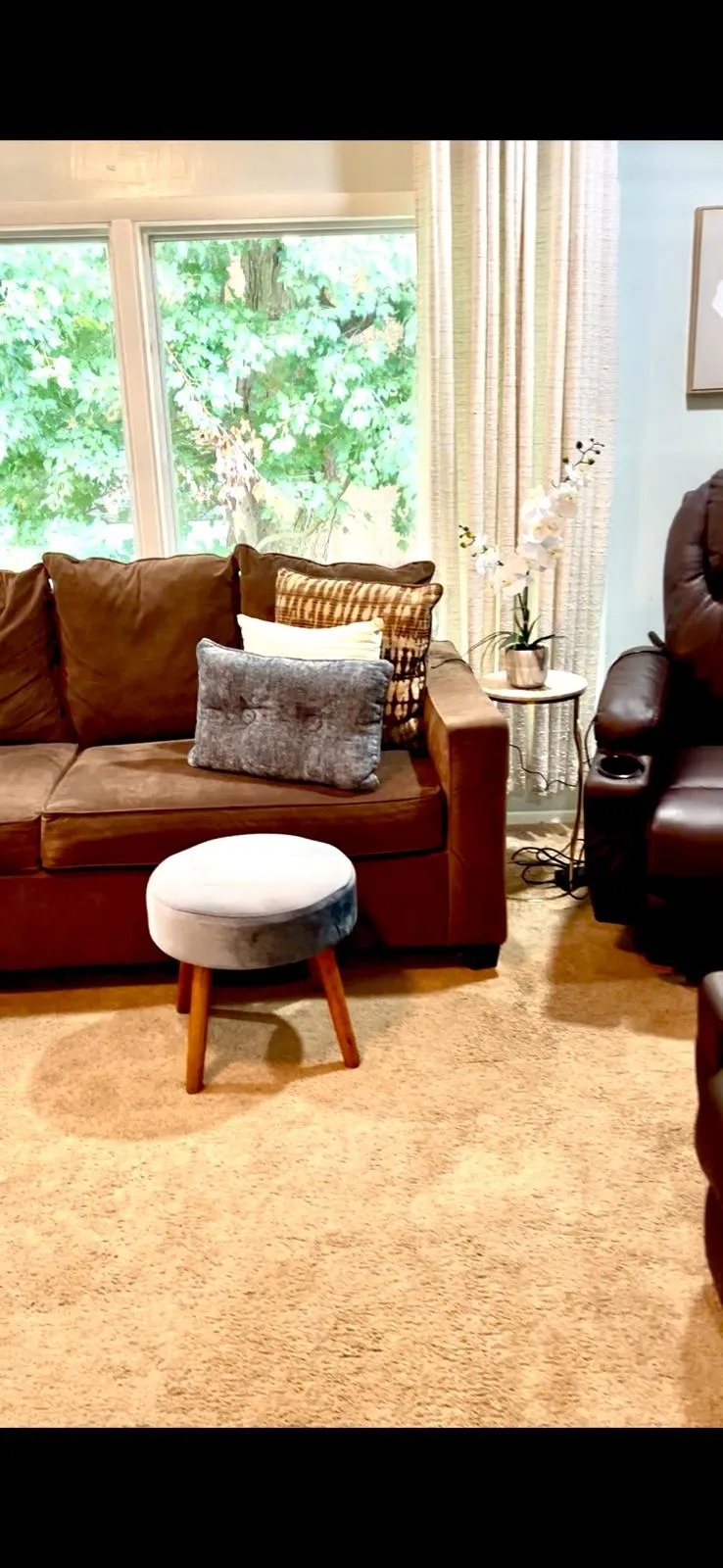 Cozy interior seating area with a couch and decor.