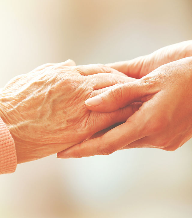 Two hands clasped together in support.