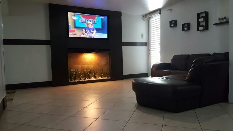 Interior common area with a television and seating