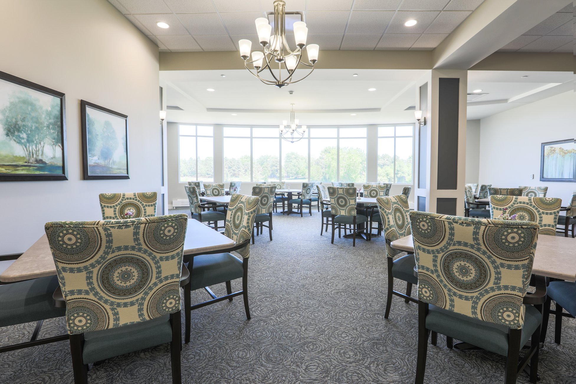 Decorative dining area with patterned chairs