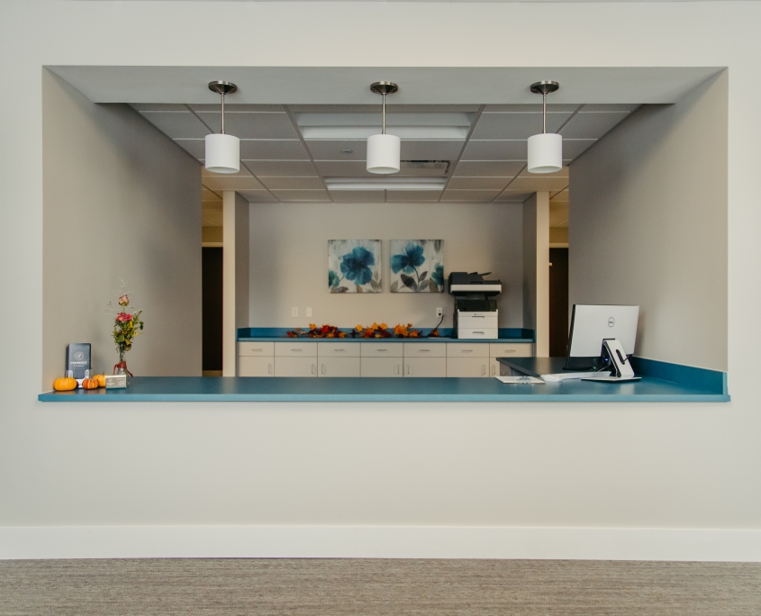 Reception area with flowers and fruit