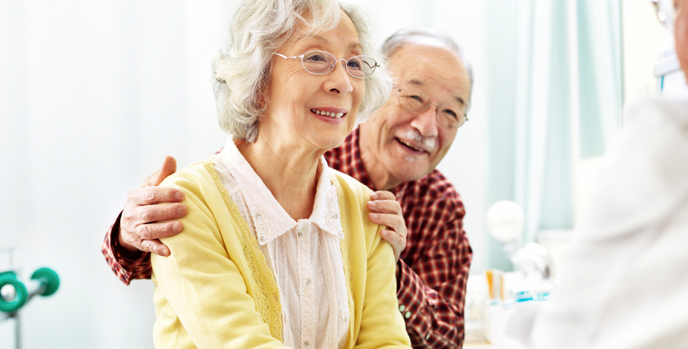 Smiling elderly couple enjoying a conversation