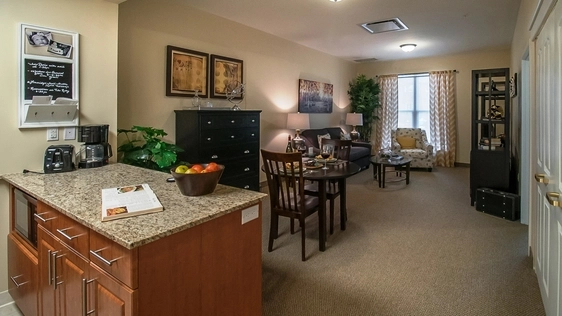 Cozy interior of a resident room with furnishings.
