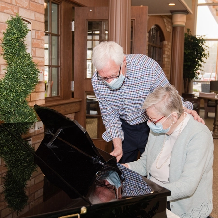 Residents enjoying music together in a common area.