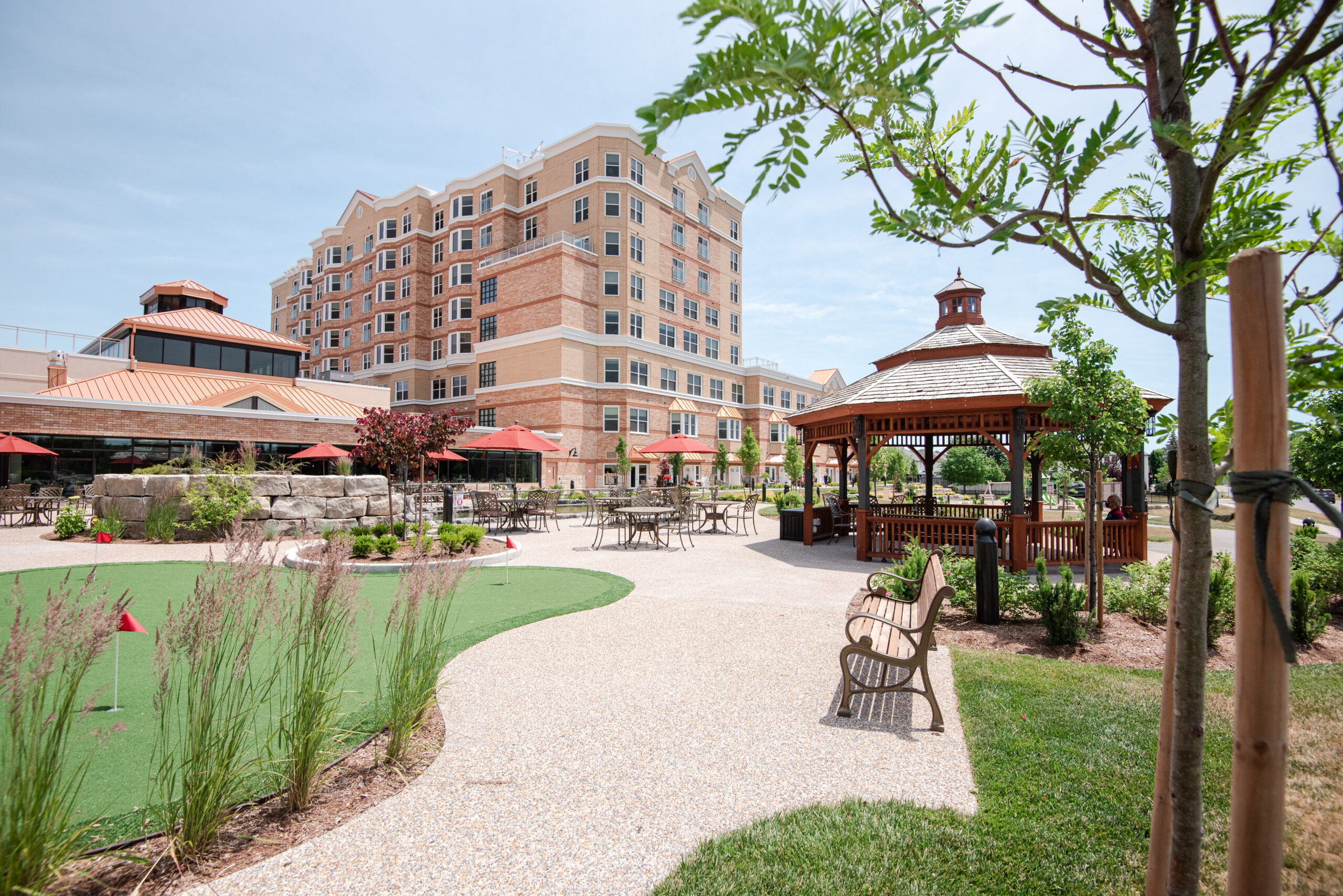 Beautiful outdoor garden area with gazebo and seating.