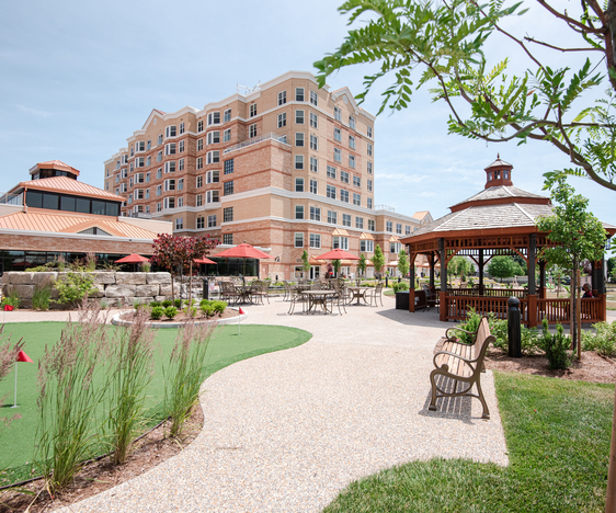 Outdoor courtyard with seating and gazebo