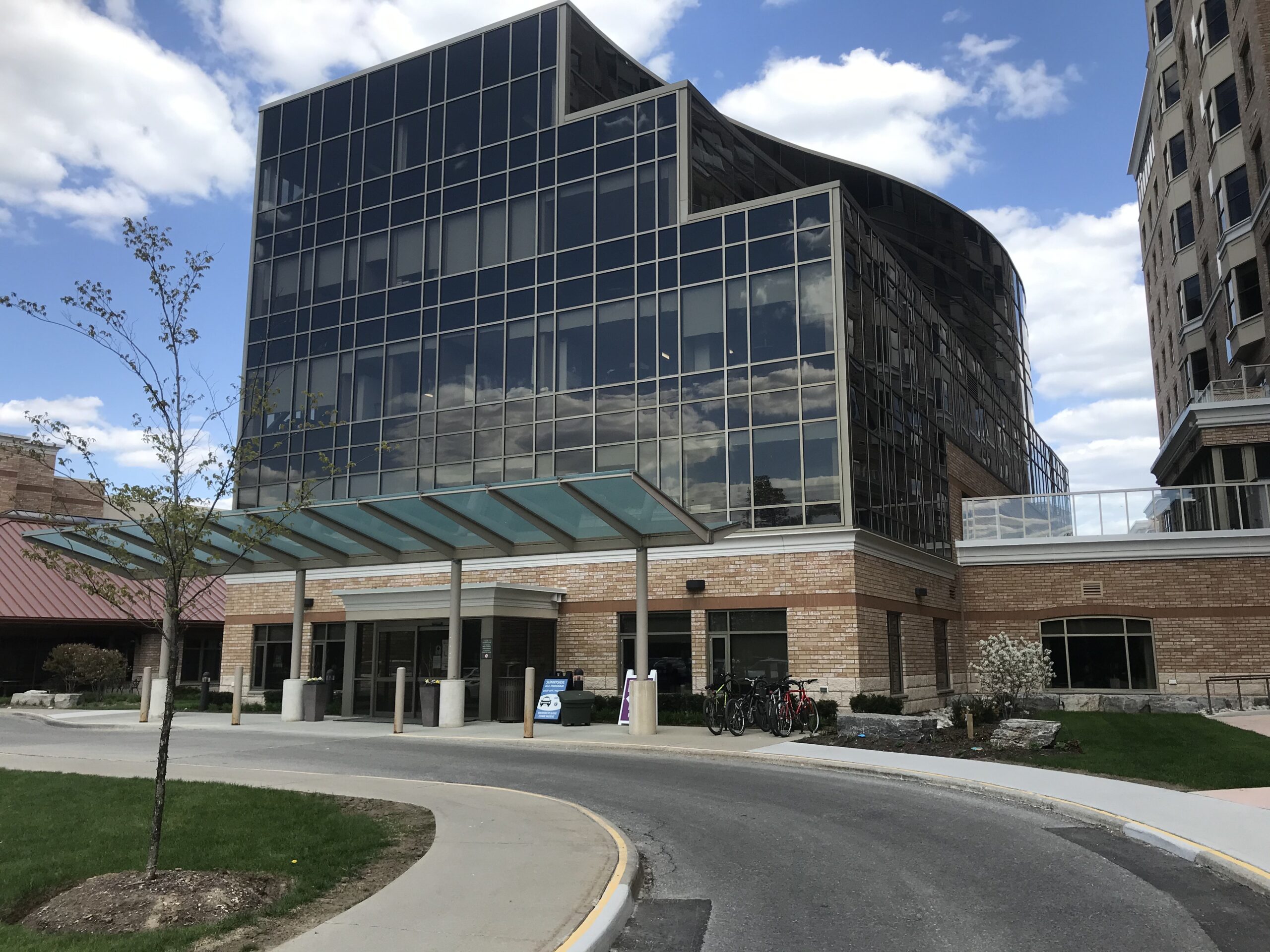 Exterior view of Fairview Nursing Home with windows and canopy.
