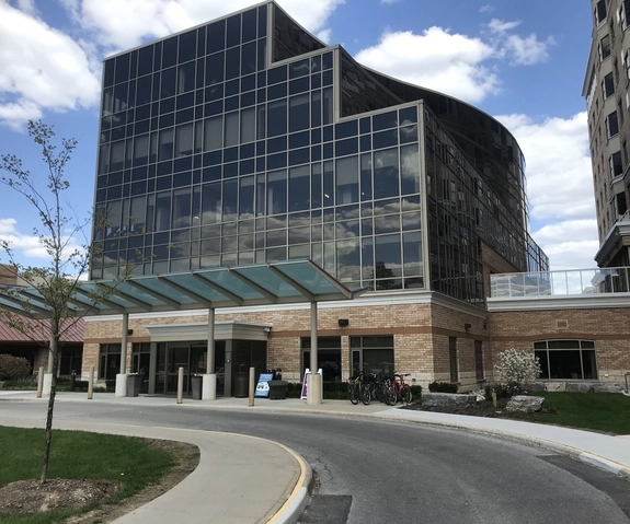 Modern nursing home building with glass facade