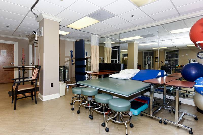 Rehabilitation therapy room with equipment.