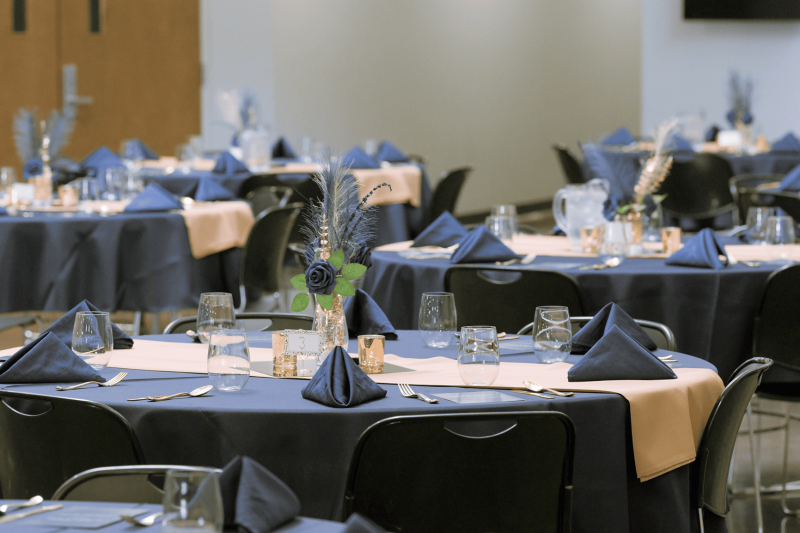 Tastefully arranged dining area with tables set for a meal.