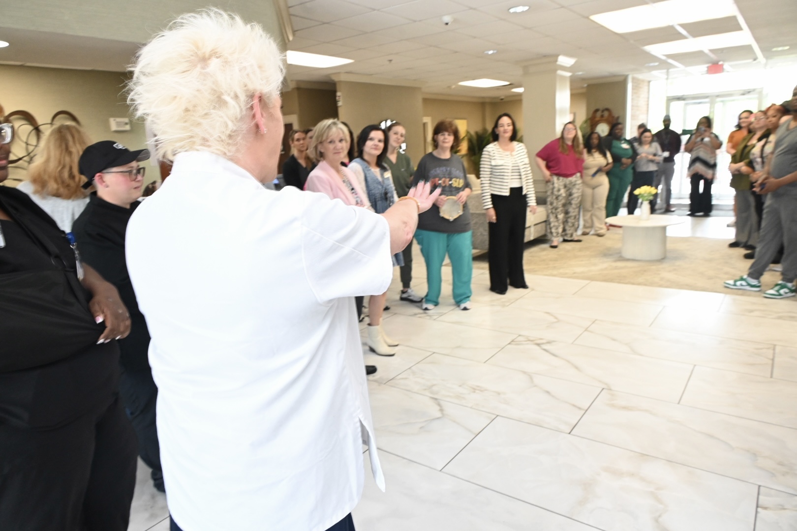 Staff and residents engaged in a group activity.