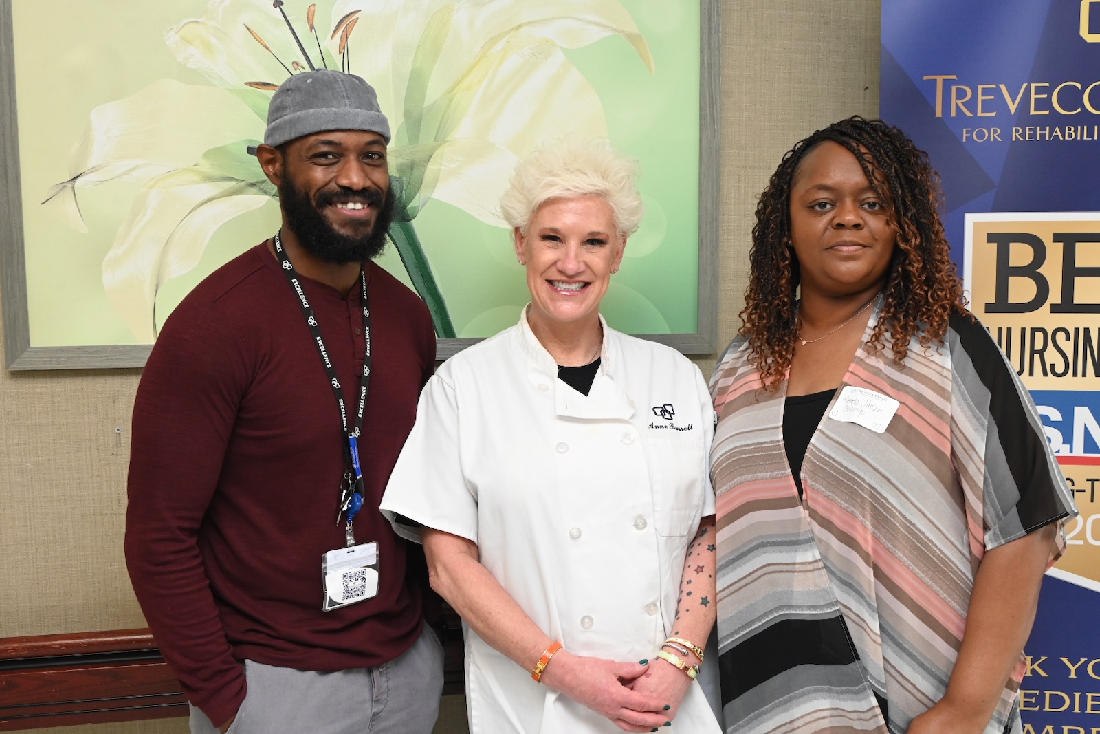 Staff members posing in a common area