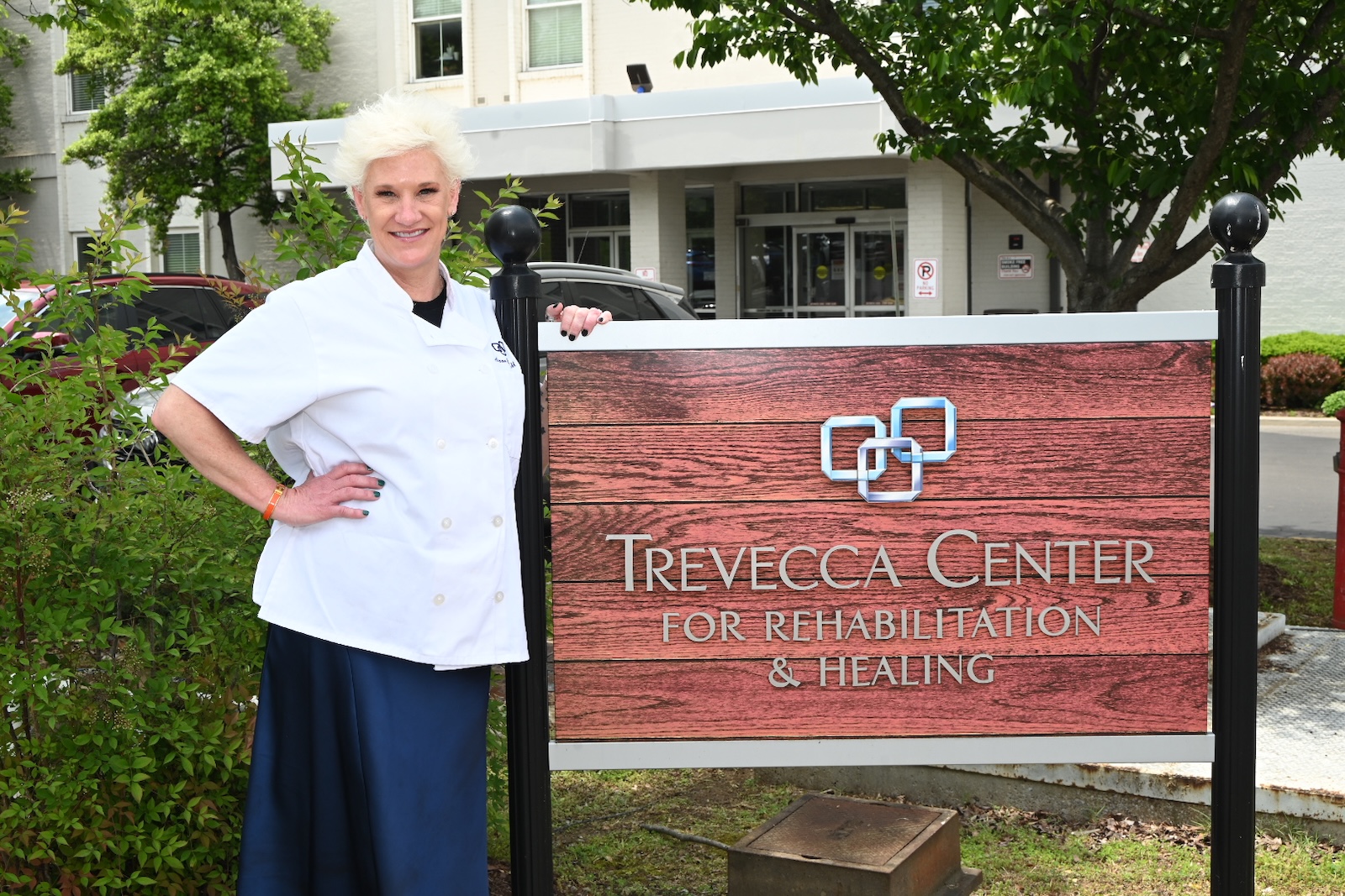 Chef in front of Trevecca Center sign