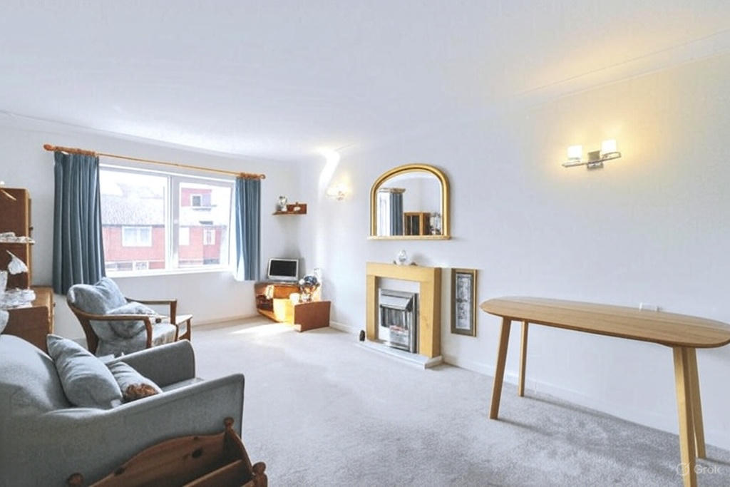 Bright and cozy lounge area with a fireplace