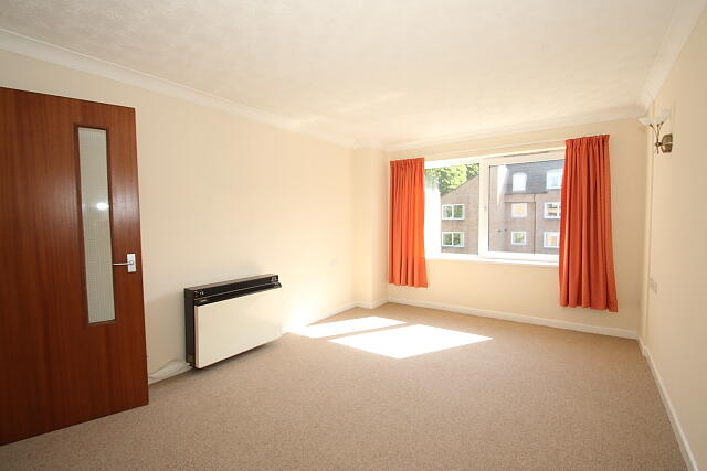 Empty common room with natural light