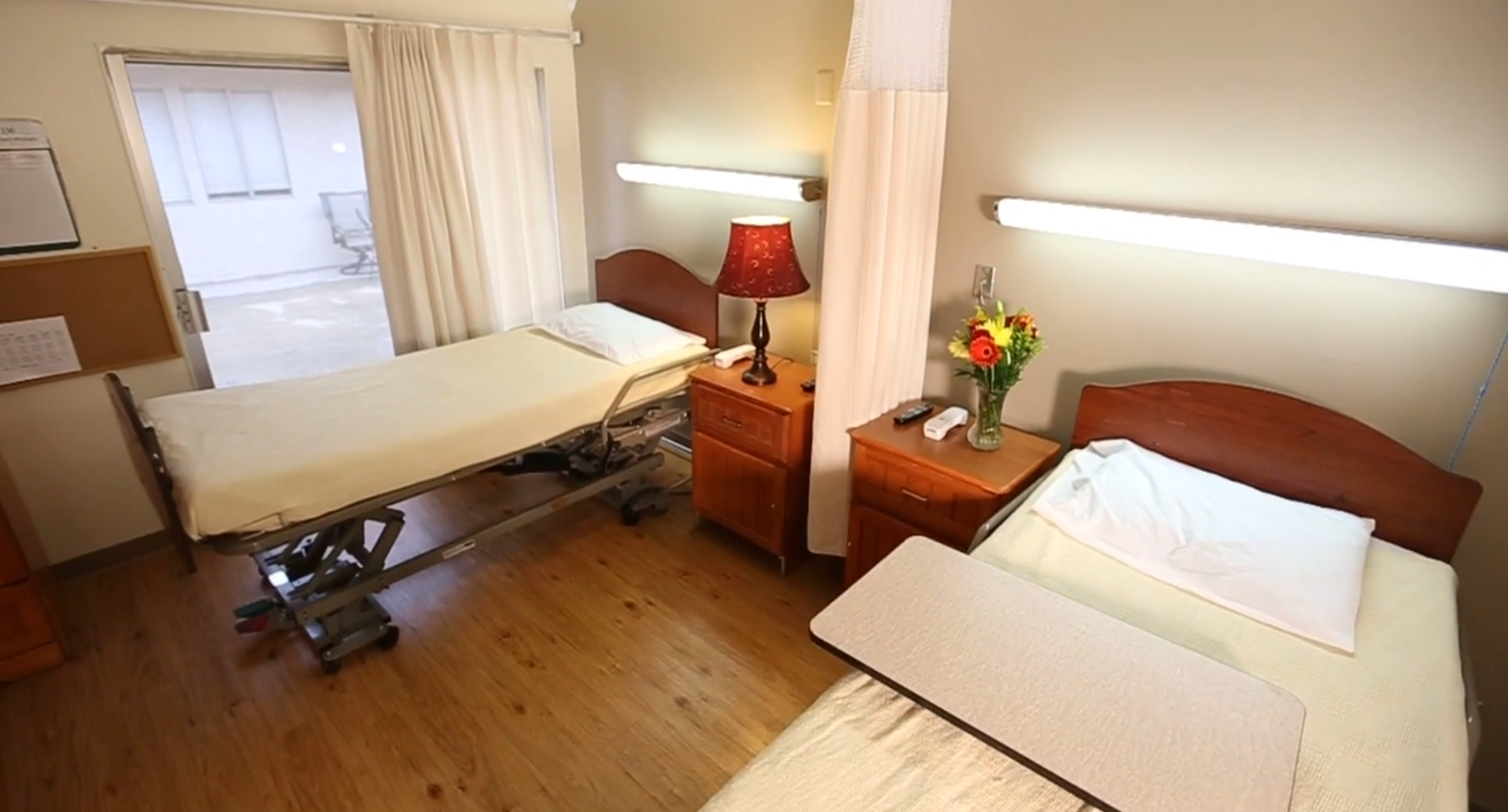 Interior view of a shared resident room with two beds